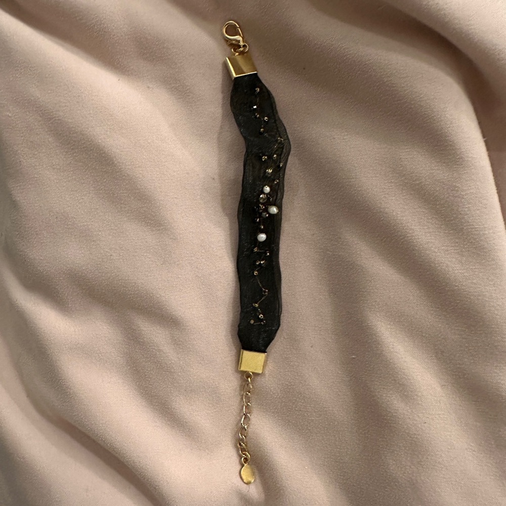 Elegant Black and Gold Bracelet with Mesh